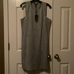 Blue suede dress with zip front and hidden pockets in front